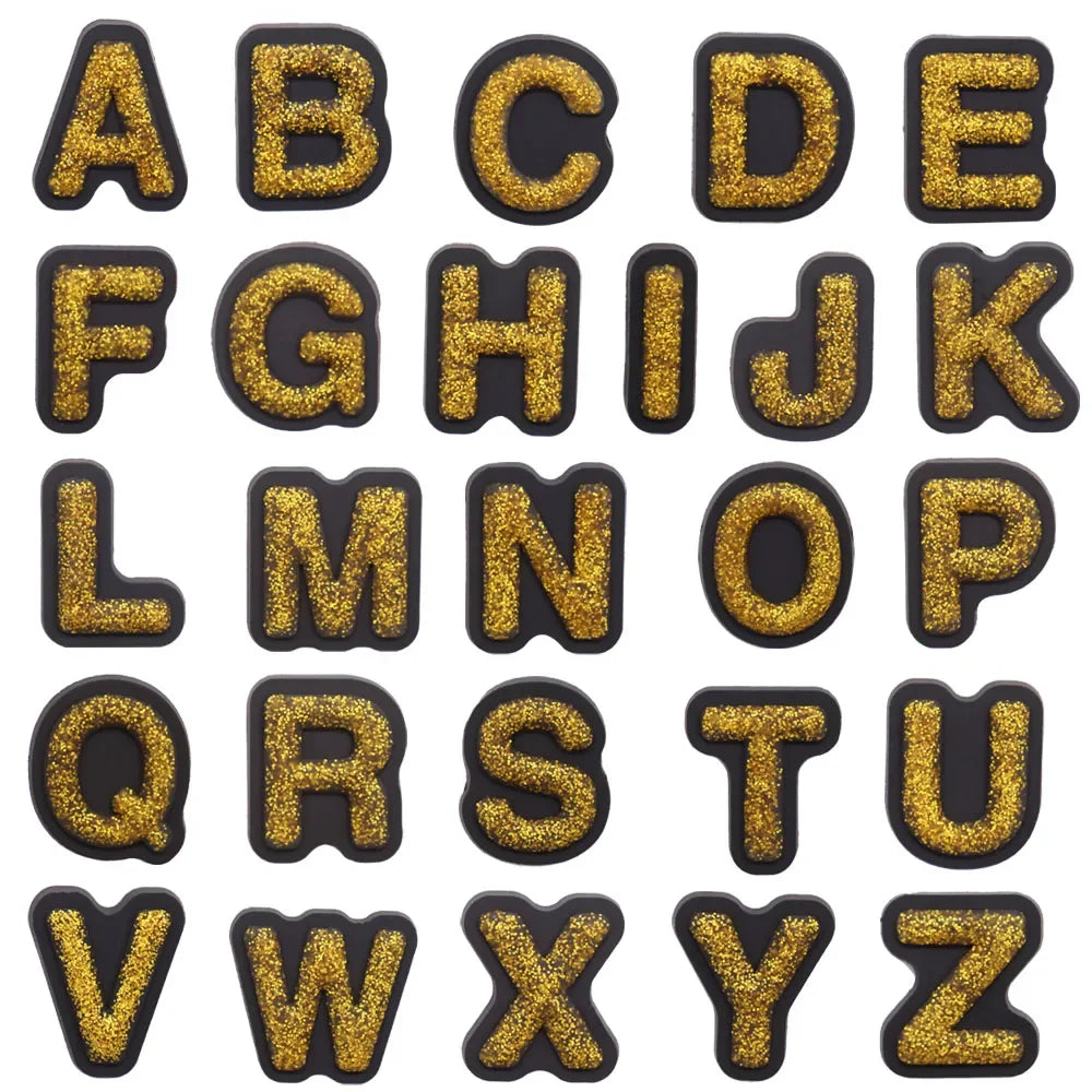 shoe charms Gold glittery letters A to Z on a white background