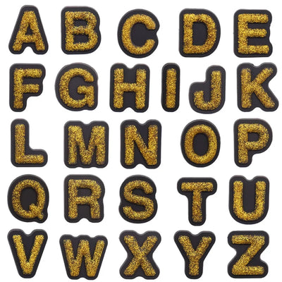 shoe charms Gold glittery letters A to Z on a white background