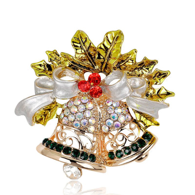 Decorative brooch with gold leaves, red and green gemstones on a white background