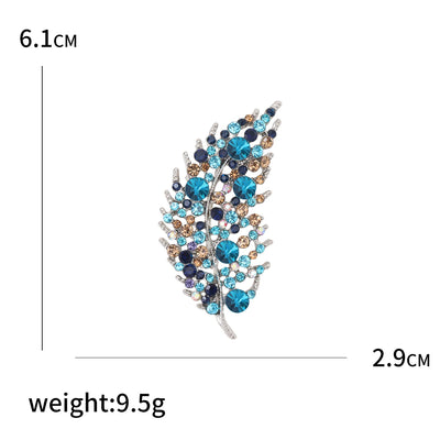 Jewelry brooch with gemstones on a white background