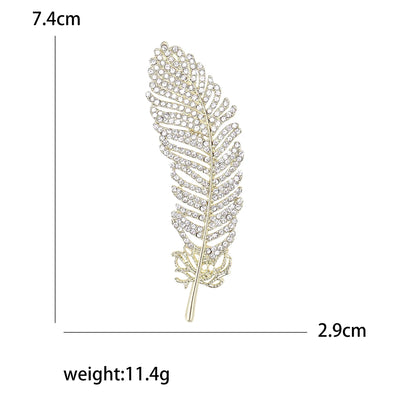 Decorative feather with measurements and weight on a white background