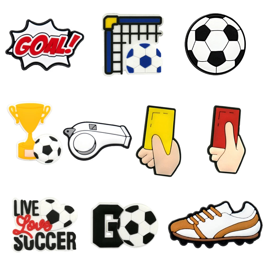Collection of soccer-themed shoe charms including a goal, soccer ball, trophy, whistle, cards, and cleats on a white background.