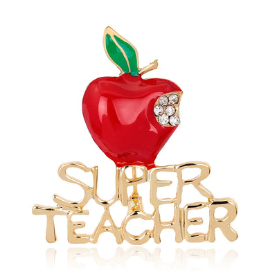 Red apple-shaped brooch with 'Super Teacher' text on a white background