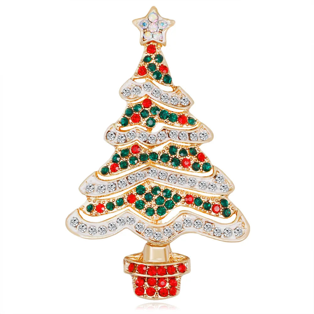 Christmas tree-shaped brooch with red, green, and clear gemstones on a white background