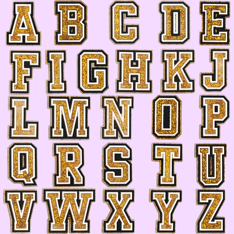shoe charms Glittery gold and black letters on a pink background