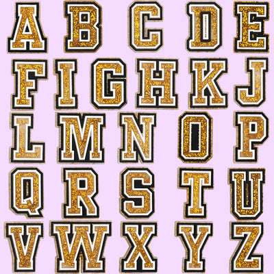 shoe charms Glittery gold and black letters on a pink background
