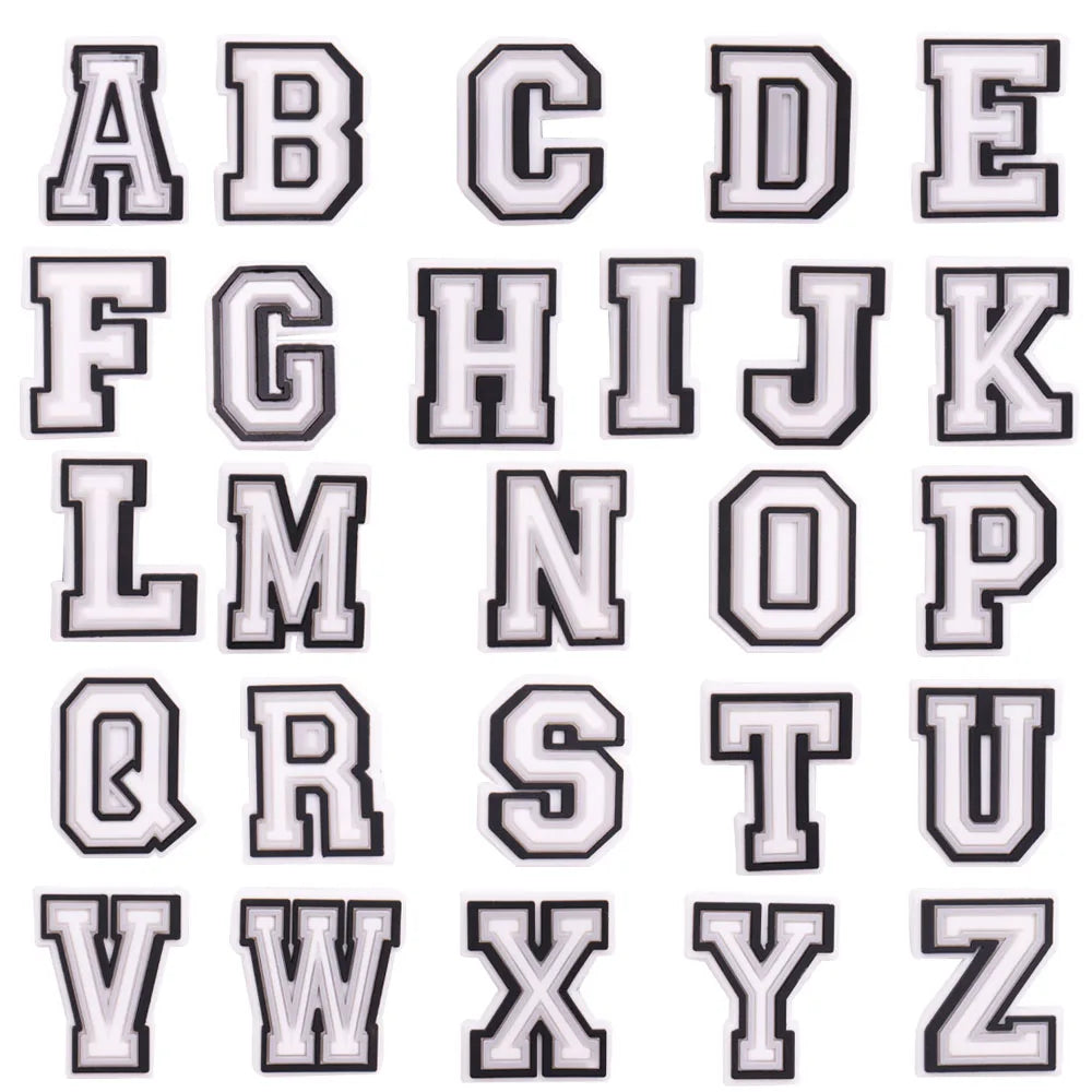 shoe charms White letters A to Z on a black background