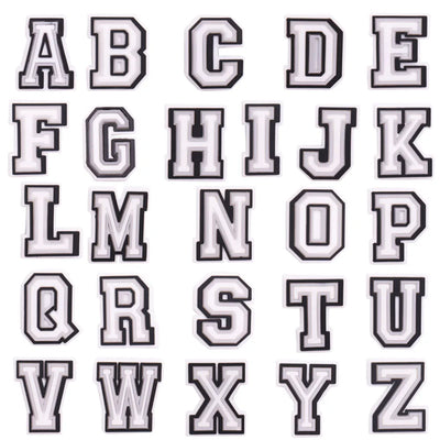 shoe charms White letters A to Z on a black background