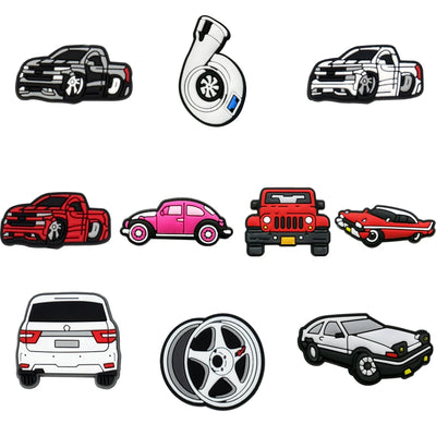 Collection of various car shoe charms on a white background