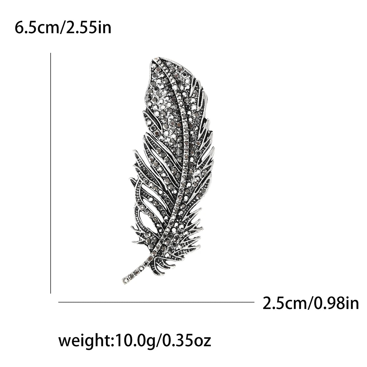 Feather-shaped brooch with measurements and weight details on a white background
