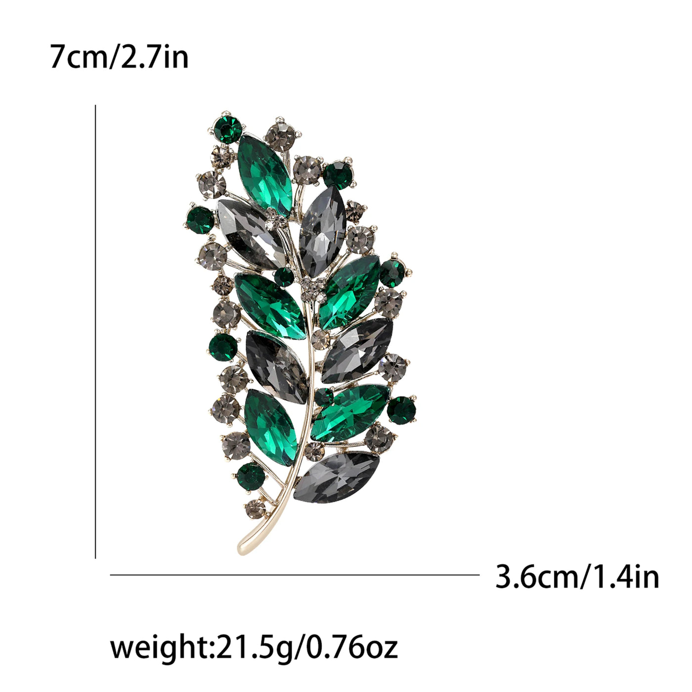 Brooch with green and gray gemstones and measurements on a white background
