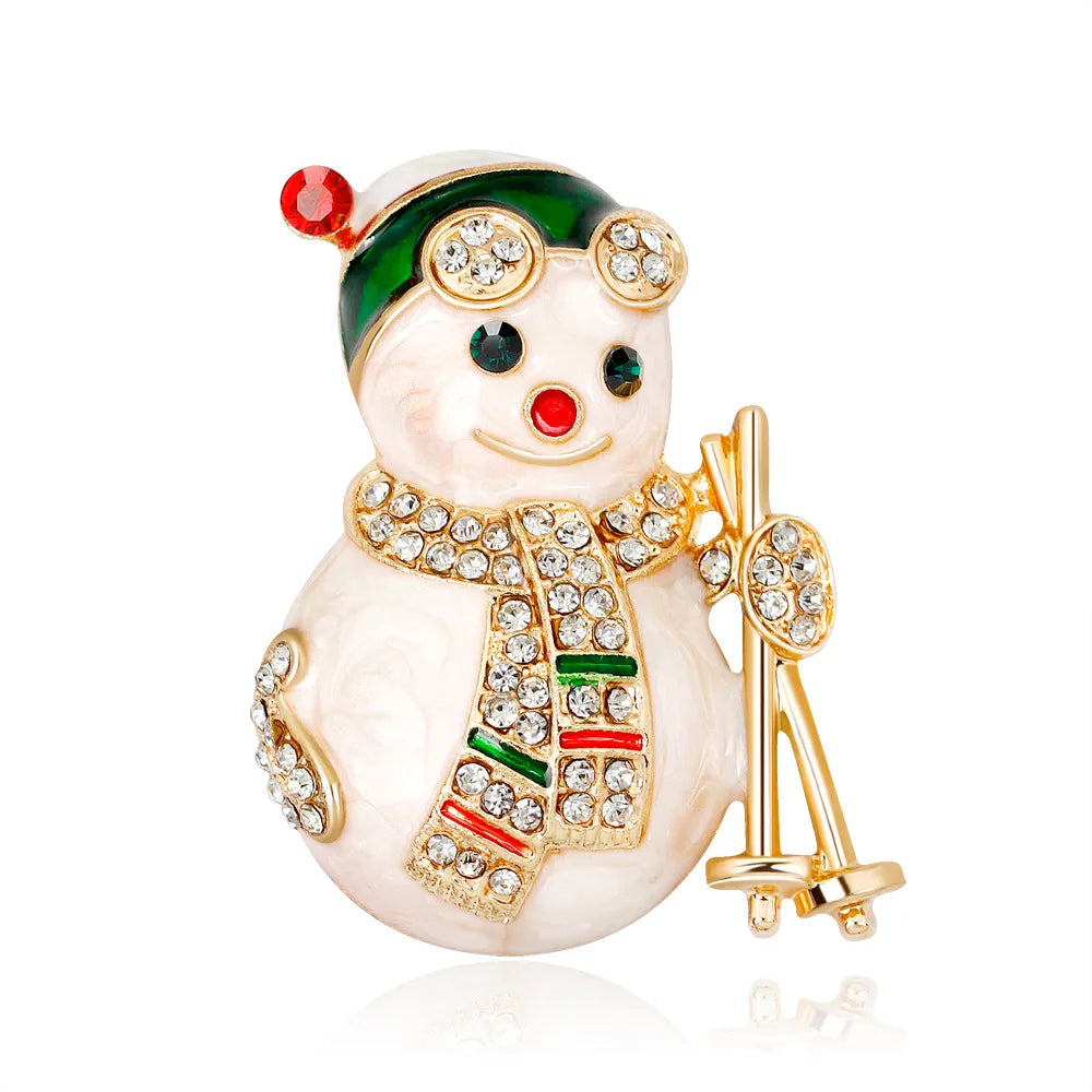 Decorative snowman figurine with a green hat, red nose, and gold scarf on a white background