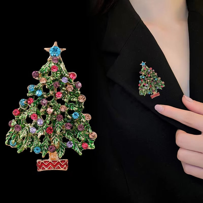 woman wearing a Colorful Christmas tree brooch on a black jacket 