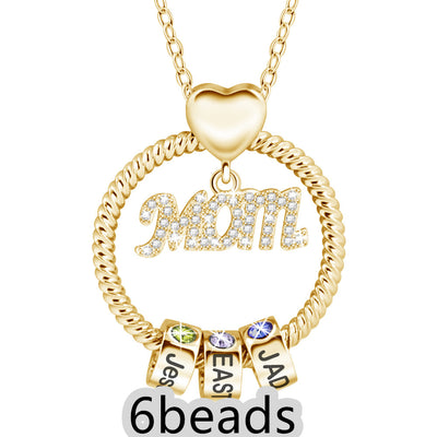 Gold necklace with 'Mom' pendant and three small beads on a white background 6 beads