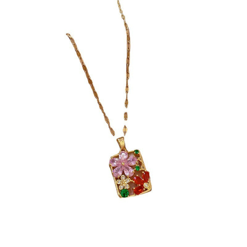 Necklace with a colorful pendant on a white background