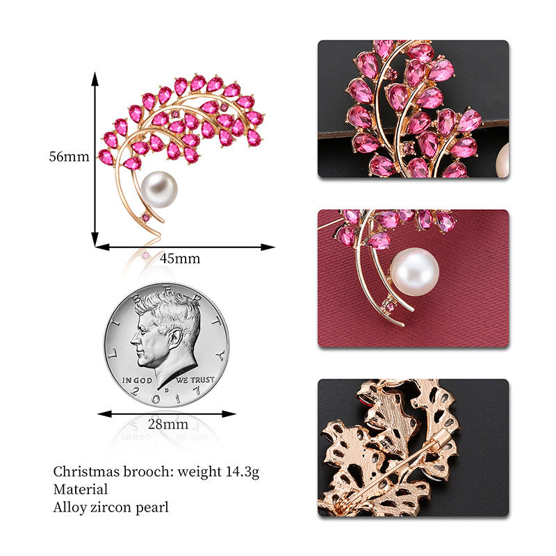 Pink floral brooch with pearl center, shown with measurements and material details.