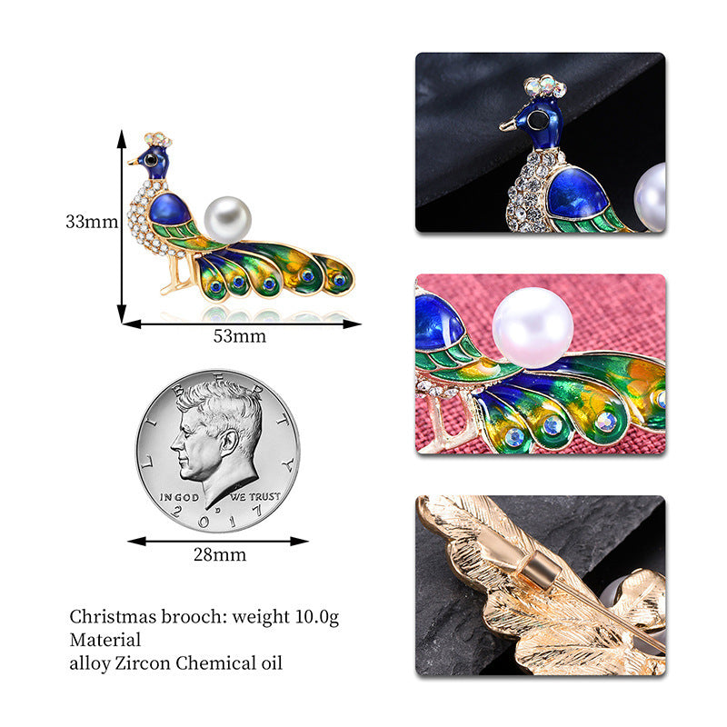 Colorful peacock-shaped brooch with measurements and material details on a white background