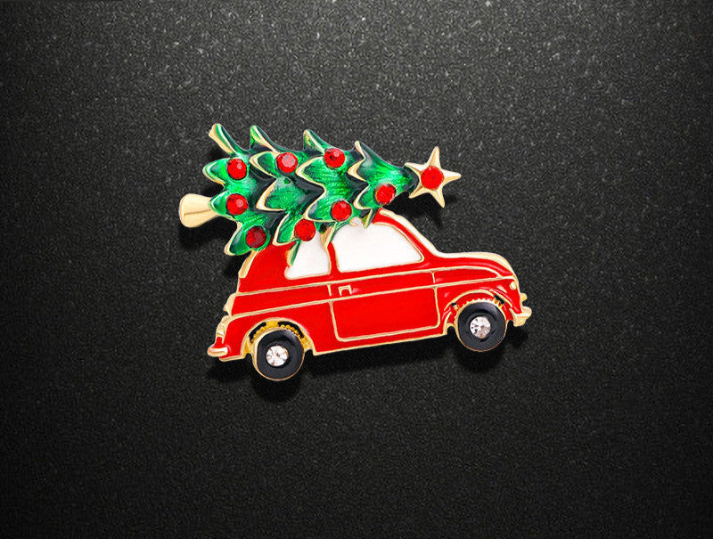 Red car with Christmas tree on a black background