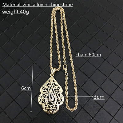 Gold necklace with pendant on a black textured background, showing measurements and material details.