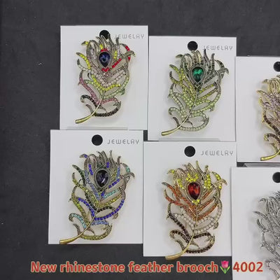 Video illustrating Colorful feather-shaped brooches on jewelry carts 