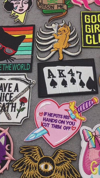 video of Gothic, feminist, punk and witchy embroidered patches – slogans, skulls, potions and cats on grey background